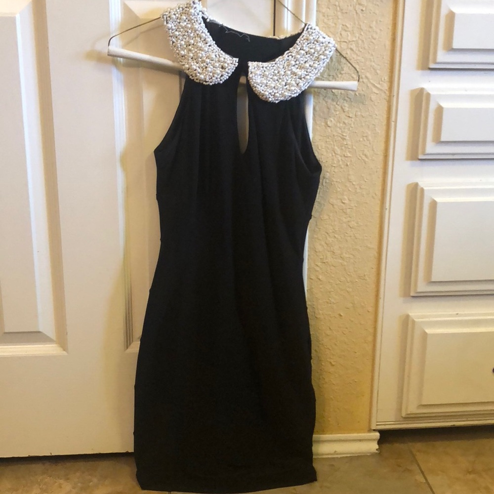 Little black dress with pearl collar